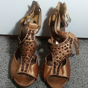 Gold and brown shoes